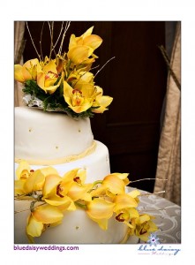 wedding cake with yellow orchids