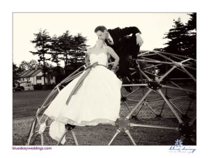 bride and groom on playground