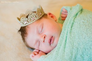 newborn baby girl with crown