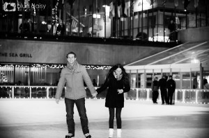newly engaged couple on ice