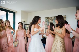 bride getting ready with bridesmaids and mom