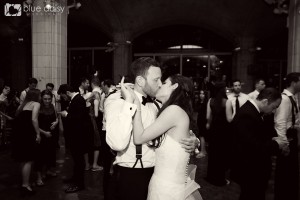 bride and groom kissing at the end of their wedding day