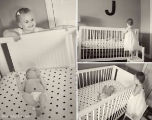 big sister peeking into baby's crib